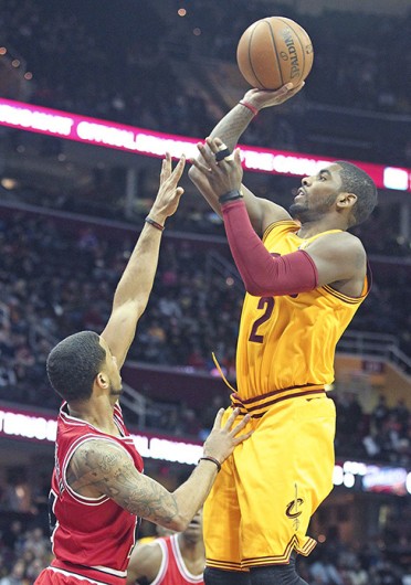 Cleveland Cavaliers guard Kyrie Irving attempts a shot during a game against the Chicago Bulls Jan. 22 at Quicken Loans Arena. The Cavaliers lost, 98-87. Courtesy of MCT