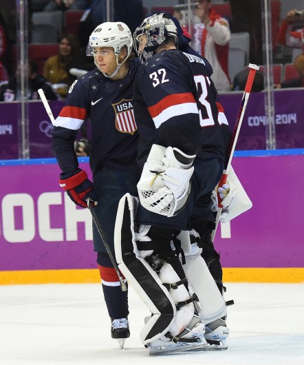 U.S. forward Joe Pavelski (left) and goalie Jonathan Quick greet each other following their lost to Finland in the men's Bronze Medal hockey game at the Winter Olympics in Sochi, Russia, Feb. 22. Finland defeated USA 5-0. Courtesy of MCT