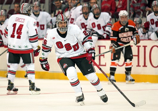 Junior forward Matt Johnson (26) switches onto the ice during a game against Bowling Green Oct. 29 at the Schottenstein Center. OSU won, 5-3. Credit: Shelby Lum / Photo editor