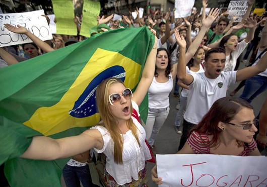 Demonstrators participate in a protest against the rising public transport prices, and the Brazilian government's lavish spending for the FIFA Confederations Cup and World Cup soccer events June 19 in Belo Horizonte, Minas Gerais, Brazil. Courtesy of MCT