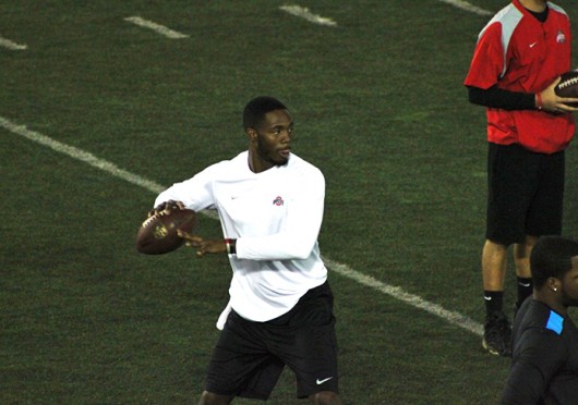 Former quarterback Kenny Guiton throws the ball during Ohio State’s Pro Day March 7 at the Woody Hayes Athletic Center. Credit: Ryan Robey / For The Lantern