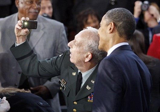 Perry Parks (left) takes a selfie with President Obama during the President's visit to Winston-Salem, N.C., on Dec. 6, 2010.  Credit: Courtesy of MCT