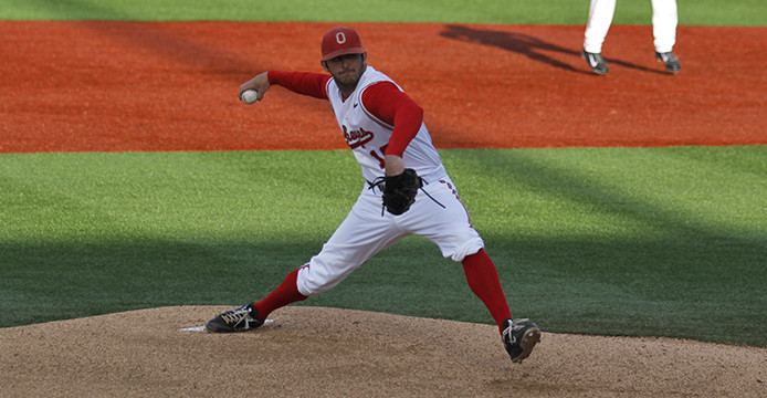 Then-junior pitcher Trace Dempsey prepares to deliver a pitch during a game against Ohio University April 1 at Bill Davis Stadium. OSU won, 11-6. Credit: Lantern file photo