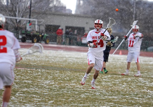 Senior midfielder Michael Italiano (24) passes the ball the ball during a game against Notre Dame March 25 at Jesse Owens Memorial Stadium. OSU lost, 13-7. Credit: Shelby Lum / Photo editor