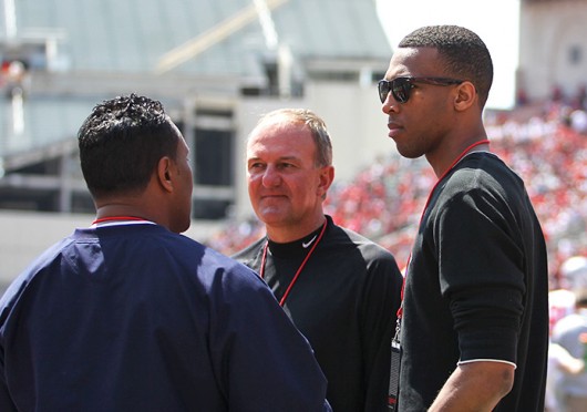 Trevor Thompson (right) talks with OSU men’s basketball coach Thad Matta during the 2014 Spring Game April 12 at Ohio Stadium. Thompson announced his decision to transfer to Ohio State April 13. Credit: Shelby Lum / Photo editor