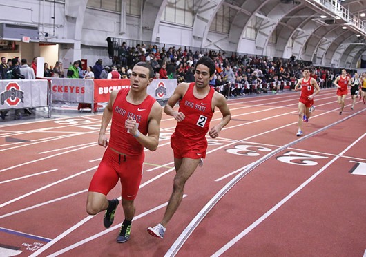 Distance runners, freshman Dominik Seitzer (left) and redshirt-sophomore Josh Sabo, pace the field during the Buckeye Tune-Up Feb. 21 at French Field House. Credit: Brandon Claflin / Lantern photographer