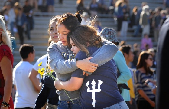 University of California at Santa Barbara students hug May 27 after a memorial service for the students who died in a shooting May 23 in Isla Vista, Calif. In the wake of the shooting, many people took to Twitter to voice their opinions on unequal treatment of women with the hashtag #YesAllWomen. Credit: Courtesy of MCT