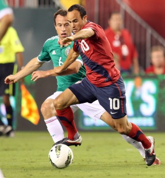 USA's Landon Donovan (10) and Mexico's Gerardo Torrado (6) compete for the ball during the first half of an international friendly at Lincoln Financial Field in Philadelphia, Pennsylvania on Wednesday, August 10, 2011. Credit: Courtesy of MCT.