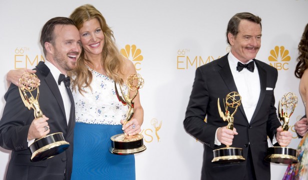 Aaron Paul, Anna Gunn and Bryan Cranston pose for press photos In Los Angeles after winning Emmys for "Breaking Bad" on Aug. 25, 2014.  Credit: Courtesy of MCT