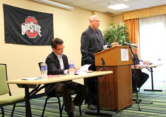 From left: TBDBITL Alumni Club president Brian Golden, director emeritus Paul Droste and law chair Gary Leppla oversee a meeting at the Fairfield Inn on Olentangy River Road on Sept. 12. The meeting dealt heavily with the association's newly published report on the firing of former band director Jonathan Waters.  Credit: Lee McClory / Design editor 