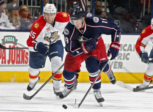 Columbus Blue Jackets center Ryan Johansen (19) carries the puck up ice in front of the Florida Panthers' Drew Shore (15) during a game at Nationwide Arena in Columbus on  March 1, 2014. Columbus won, 6-3. Credit: Courtesy of MCT
