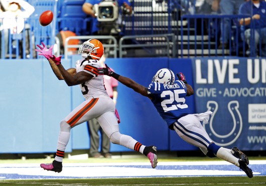 Cleveland Browns wide receiver Josh Gordon (13) just misses a catch that would have been a touchdown against Indianapolis Colts cornerback Jerraud Powers (25) on a play during second half action on Oct. 21, 2012, in Indianapolis. The Colts won, 17-13. Credit: Courtesy of MCT