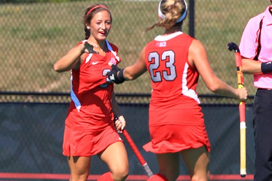 Junior forward Peanut Johnson (3) celebrates with freshman midfielder Maddy Humphrey (23) during a game against Syracuse on Aug. 29 in Columbus. OSU lost, 3-2, in overtime.  Credit: Courtesy of OSU athletics