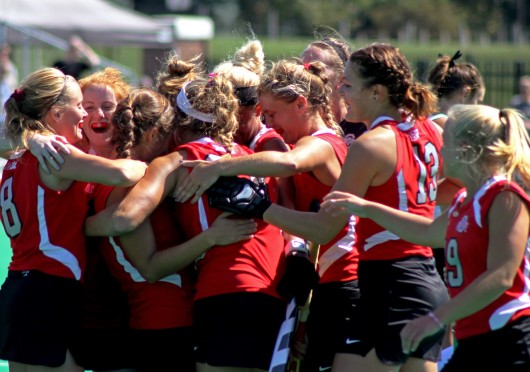 Members of the OSU field hockey team celebrate during a game against Ball State on Sept. 14 at Buckeye Varsity Field. OSU won, 3-2, in overtime. Credit: Melissa Prax / Lantern photographer