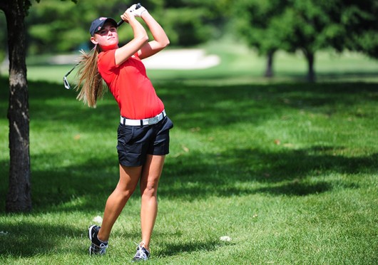 Then-freshman Jessica Porvasnik holds her follow-through after a shot during fall practice in 2013 at the OSU Golf Club. Porvasnik played in the 2014 U.S. Women's Open after being named Big Ten Player of the Year as a freshman. Credit: Courtesy of OSU athletics