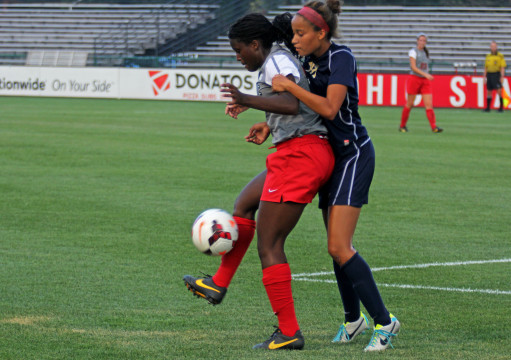 OSU then-freshman forward Nichelle Prince (left) makes a play on the ball in a game against Pittsburgh at Jesse Owens Memorial Stadium  Aug. 28, 2013. OSU won 2-0.  Credit: Lantern file photo
