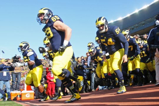 The Michigan Wolverines football team takes the field for a game against OSU on Nov. 30 at Michigan Stadium. OSU won, 42-41. Credit: Lantern file photo