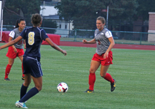 OSU then-sophomore midfielder Michela Paradiso approaches a defender during a game against Pittsburgh Aug. 28, 2013 at Jesse Owens Memorial Stadium. OSU won 2-0 Credit: Lantern file photo