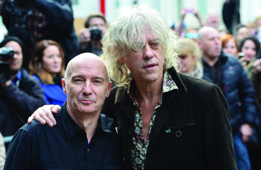 Midge Ure (left) and Bob Geldof arrive for the recording of the Band Aid 30 single Nov. 15 at Sarm Studios in Notting Hill in London. Credit: Courtesy of TNS