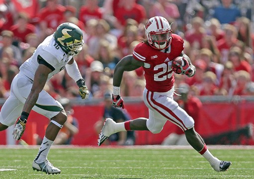 Wisconsin redshirt-junior running back Melvin Gordon (25) carries the ball during a game against South Florida at Camp Randall Stadium in Madison, Wis., on Sept. 27. Wisconsin won, 27-10. Credit: Courtesy of TNS