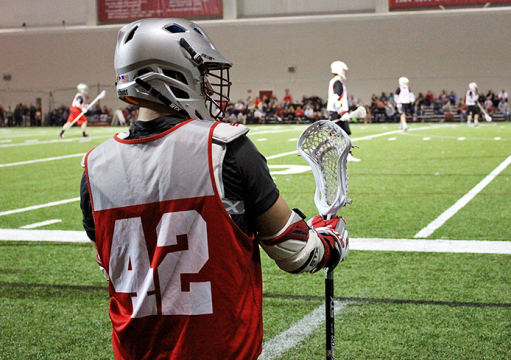 Freshman midfielder Matt Galioto waits to return to the game following a penalty in the exhibition game against The Hill Academy on Jan. 24 at Woody Hayes Athletic Center. The Buckeyes won, 11-4. Credit: Molly Tavoletti / Lantern reporter