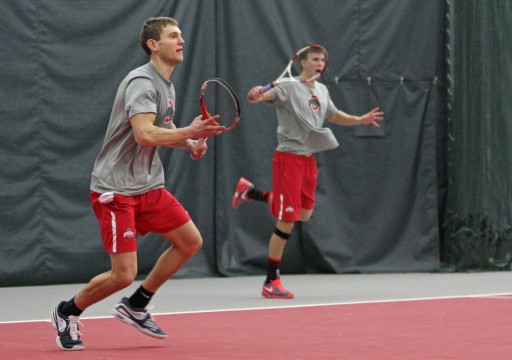 Junior Kevin Metka and Senior Peter Kobelt play in a match against Texas A&M on Sunday, Feb. 09 at the Varsity Tennis Center. OSU won, 4-3. Credit: Lantern file photo
