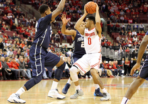Freshman guard D'Angelo Russell (0) is pressured by Penn State players during a game on Feb. 11 at the Schottenstein Center. OSU won, 75-55. Credit: Samantha Hollingshead / Lantern photographer