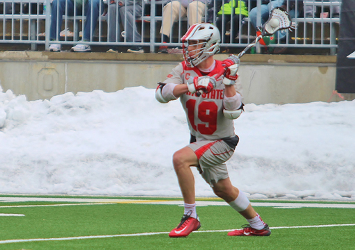 Senior midfielder Jesse King (19) carries the ball during a game against Denver on March14 in Columbus. OSU won. 13-11. Credit: Molly Tavoletti / Lantern reporter