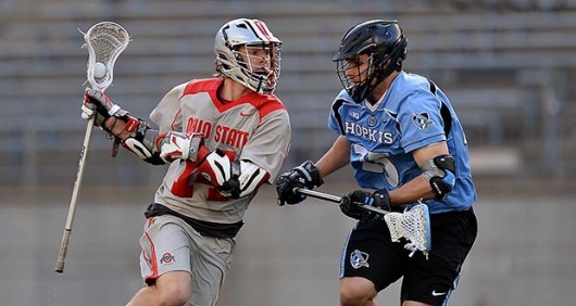 OSU then-junior attackman Carter Brown (14) during the Buckeyes’ 15-12 win against Johns Hopkins on March 5 at Ohio Stadium.  Credit: Courtesy of OSU
