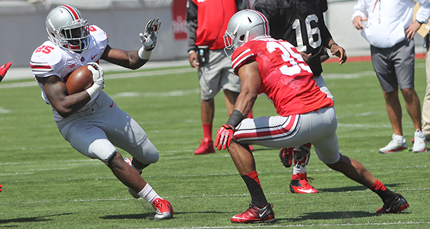 Then-redshirt-sophomore running back Bri'onte Dunn (25) carries the ball during the 2014 OSU Spring Game on at Ohio Stadium. Credit: Lantern file photo 