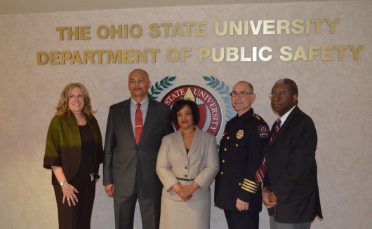 (From left) Andraea “AJ” Douglass, Deputy Chief Craig Stone, Craig’s wife Cathy, Chief Paul Denton, and OSU Department of Public Safety Director Vernon Baisden on May 1 for Stone's swearing in as newest deputy chief of University Police. Credit: Robert Scarpinito / Lantern Reporter