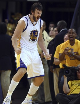 The Golden State Warriors' Andrew Bogut (12) lets out a yell after scoring against the Houston Rockets in the fourth quarter of Game 2 of the NBA Western Conference finals at Oracle Arena on May 21 in Oakland, Calif. The Warriors won 99-98. Credit: Courtesy of TNS