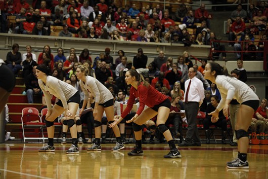 OSU women’s volleyball players get set for a serve during a game against Penn State on Oct. 31, 2014.  Credit: Lantern File Photo