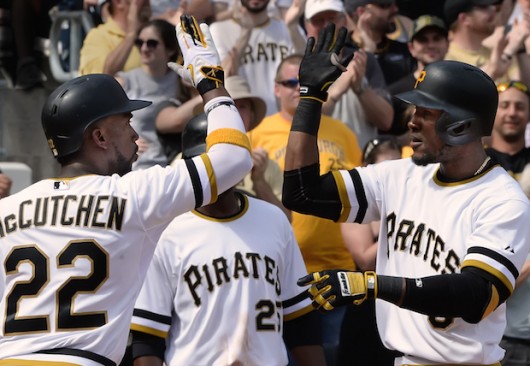 Pittsburgh Pirates outfielder Starling Marte is greeted at home by Andrew McCutchen after hitting a three-run homer against the New York Mets on May 24, 2015, at PNC Park in Pittsburgh. Credit: Courtesy of TNS