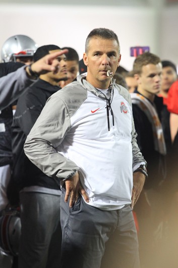 OSU coach Urban Meyer stands during the 4th annual Student Appreciation Day on April 11 at the Woody Hayes Athletic Center. Credit: Samantha Hollingshead / Photo Editor
