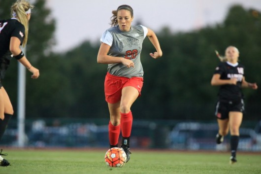 Junior forward Lindsay Agnew (20) maintains possession during a match against Illinois State on Aug. 21. Credit: Courtesy of OSU