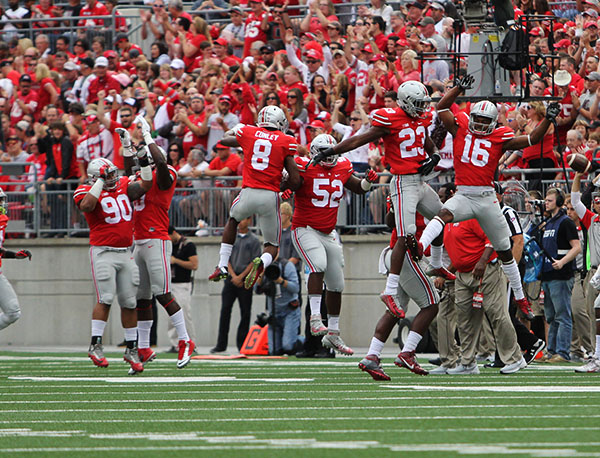 Members of the Ohio State football team celebrate during a game against Western Michigan on Sept. 26. OSU won 38-12. Credit: Samantha Hollingshead / Photo Editor
