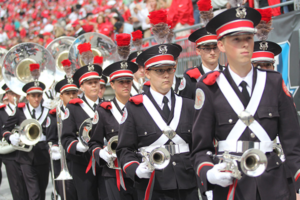 Members of the OSU marching band get ready for a performance on Sept. 12 at Ohio Stadium. Credit: Samantha Hollingshead / Photo Editor