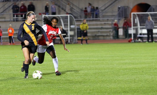 Then-sophomore Nichelle Prince (7) fights for a ball during a match Oct. 24, 2014 against Iowa at Jesse Owens Memorial Stadium. Credit: Lantern File Photo 