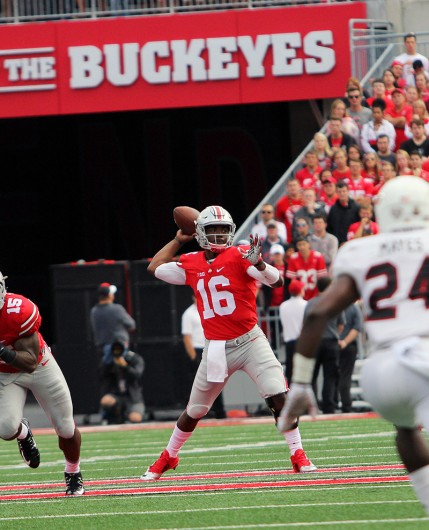 OSU then-redshirt somphomore quarterback J.T. Barrett (16) prepares to throw the ball during a game against Northern Illinois on Sept. 19 at Ohio Stadium. OSU won 20-13. Credit: Lantern File Photo 