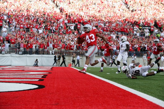 Redshirt sophomore linebacker Darron Lee steps into the end zone for a score during a game against Northern Illinois on Sept. 19. OSU won 20-13. Credit: Samantha Hollingshead / Photo Editor