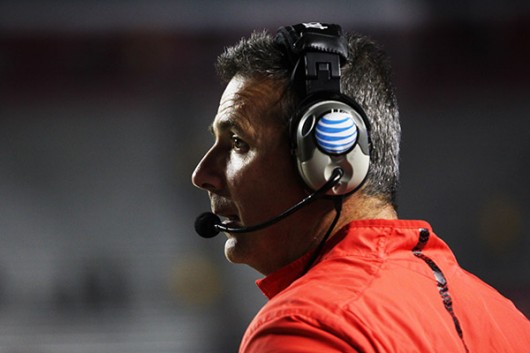 OSU coach Urban Meyer looks out toward the field during a game against Rutgers on Oct. 24. OSU won, 49-7. Credit: Samantha Hollingshead / Photo Editor 
