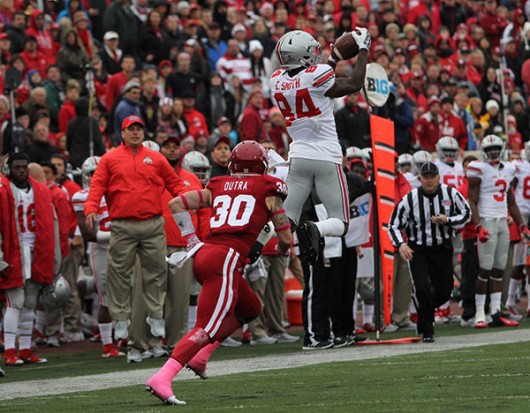 Redshirt senior wide receiver Corey Smith (84) goes up for a catch against Indiana on Oct. 3 in Bloomington, Indiana. OSU won 34-27. Credit: Samantha Hollingshead / Photo Editor