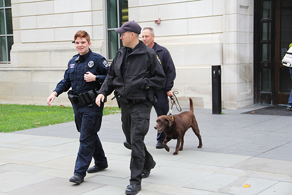 OSU PD and bomb sniffing dogs were seen outside Thomson Library on Oct. 27. Police said they were there to answer questions for students and to walk around the area. For further updates be sure to follow and check The Lantern. Credit: Samantha Hollingshead / Photo Editor