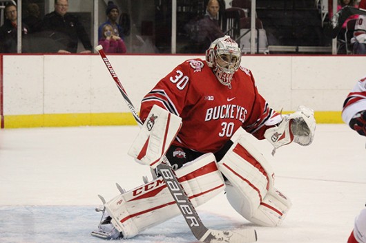 Ohio State junior goalie Christian Frey surveys the ice during an exhibition game against Brock on Oct. 3. OSU won 4-0. Credit: Kaley Rentz / Asst. Sports Director