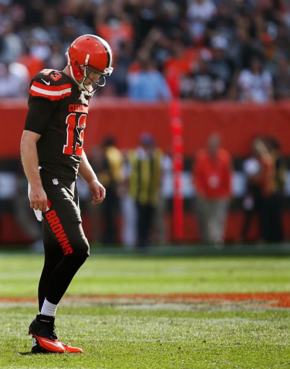 Cleveland quarterback Josh McCown hangs his head as he walks off the field after throwing an interception to Oakland safety Charles Woodson to end the Browns' late fourth quarter drive on Sunday, Sept. 27, 2015, at FirstEnergy Stadium in Cleveland. Credit: Courtesy of TNS