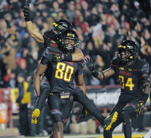 Members of the Maryland Terrapins celebrate a touchdown on Nov. 15, 2014 at Byrd Stadium in College Park, Md. Credit: Courtesy of TNS