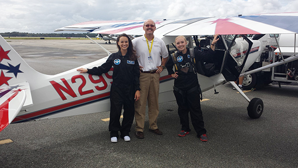 Jillian Yuricich, fourth-year in aerospace engineering, (right) with Emily Calandrelli, host of Fox’s Xploration Outer Space, training with a Super Decathlon aircraft. Credit: Courtesy of Jillian Yuricich 