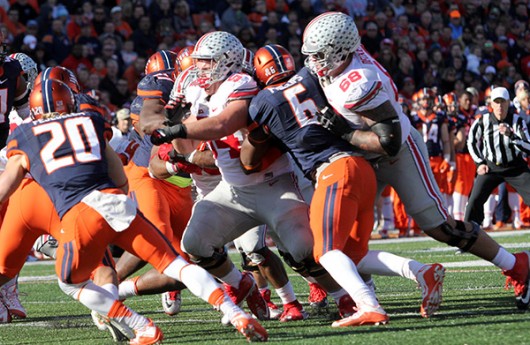 Former OSU offensive linemen Taylor Decker (68) blocks defender during a game against Illinois on Nov. 14 at Memorial Stadium in Champaign, Illinois. Credit: Samantha Hollingshead | Photo Editor 
