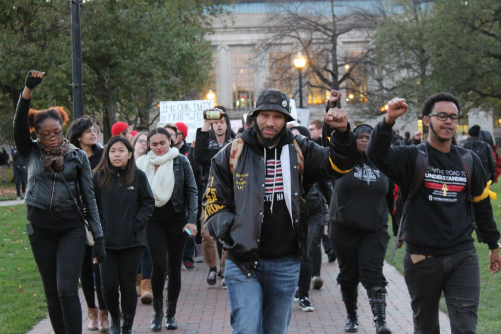 Ohio State students and protesters marched from the Oval to the Ohio Union on Friday, during the "#OSU2MIZZOU: Racism Lives Here" event. Credit: Michael Huson / Campus Editor